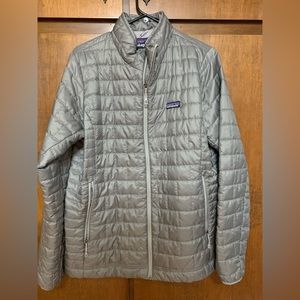 Patagonia Women’s XL silvery gray down puffer jacket.